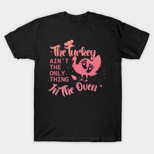 The Turkey Is Not The Only Thing In The Oven,Pregnancy announcement designed by Thanksgiving for pregnant women T-Shirt